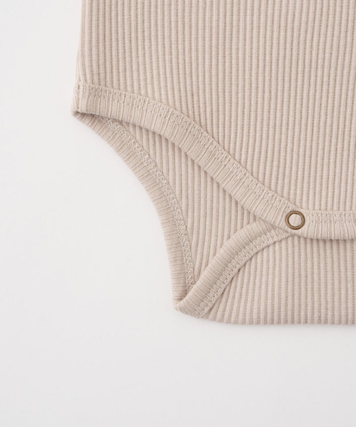 Shoulder-Frill Ribbed Long-Sleeve Romper