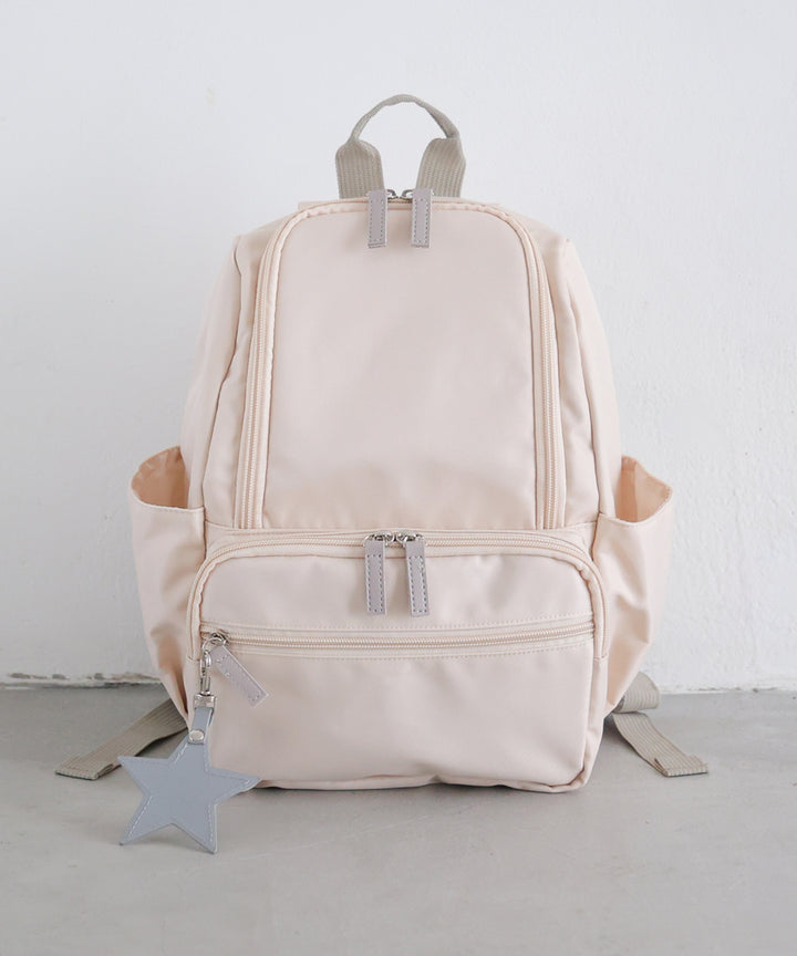 Kids' backpack with charm