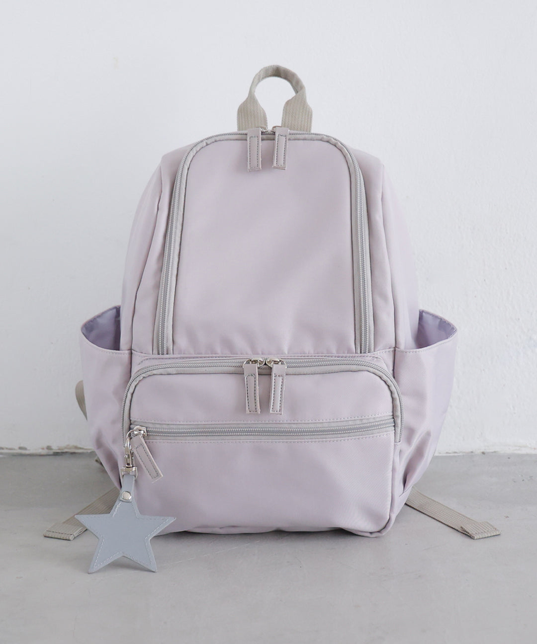 Kids' backpack with charm