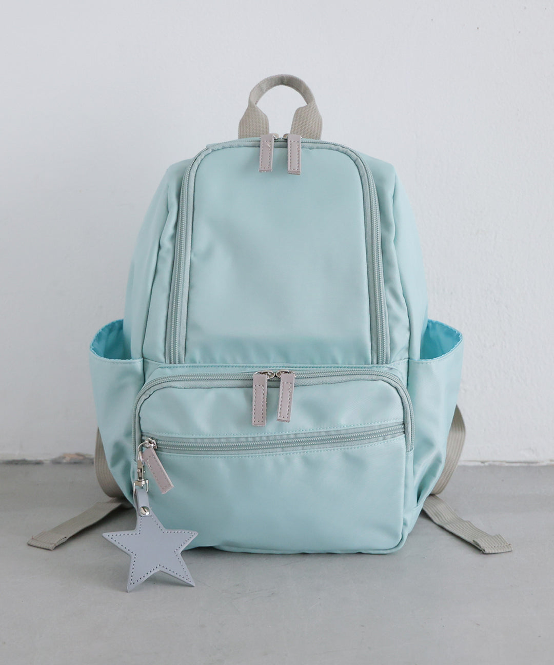 Kids' backpack with charm