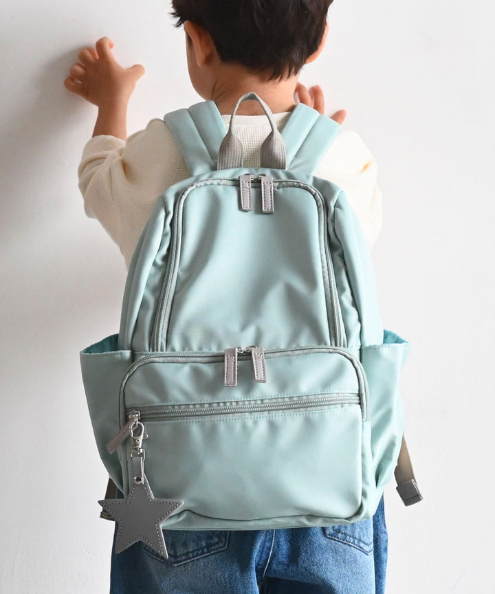 Kids' backpack with charm