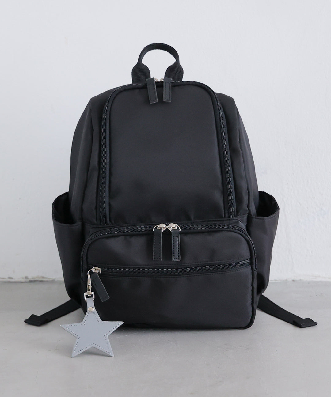 Kids' backpack with charm