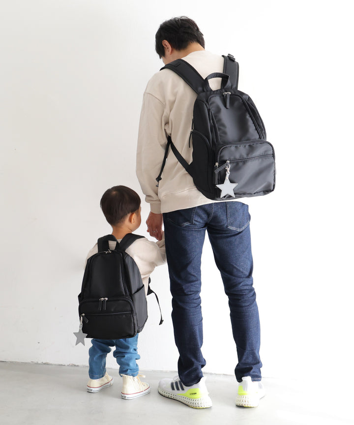 Kids' backpack with charm